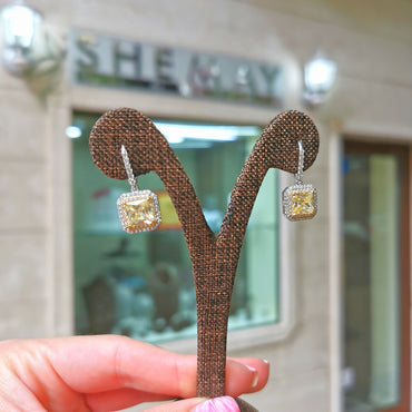 Диамантени обеци с жълти сапфири