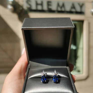 Обеци от бяло злато със сини сапфири и диаманти