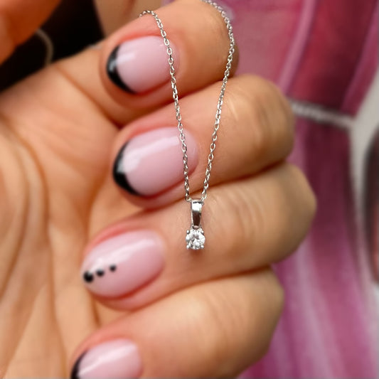 Висулка от бяло злато с диамант 0.10 карата