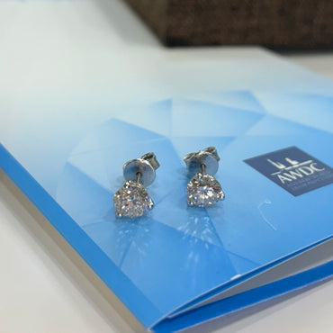 Диамантени обеци за инвестиция с инвестиционни сертификати. Обеци на винт от бяло злато с г по 1 карат диамант