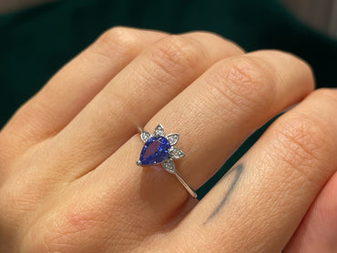 Дамски пръстен с танзанит и диаманти 0.73