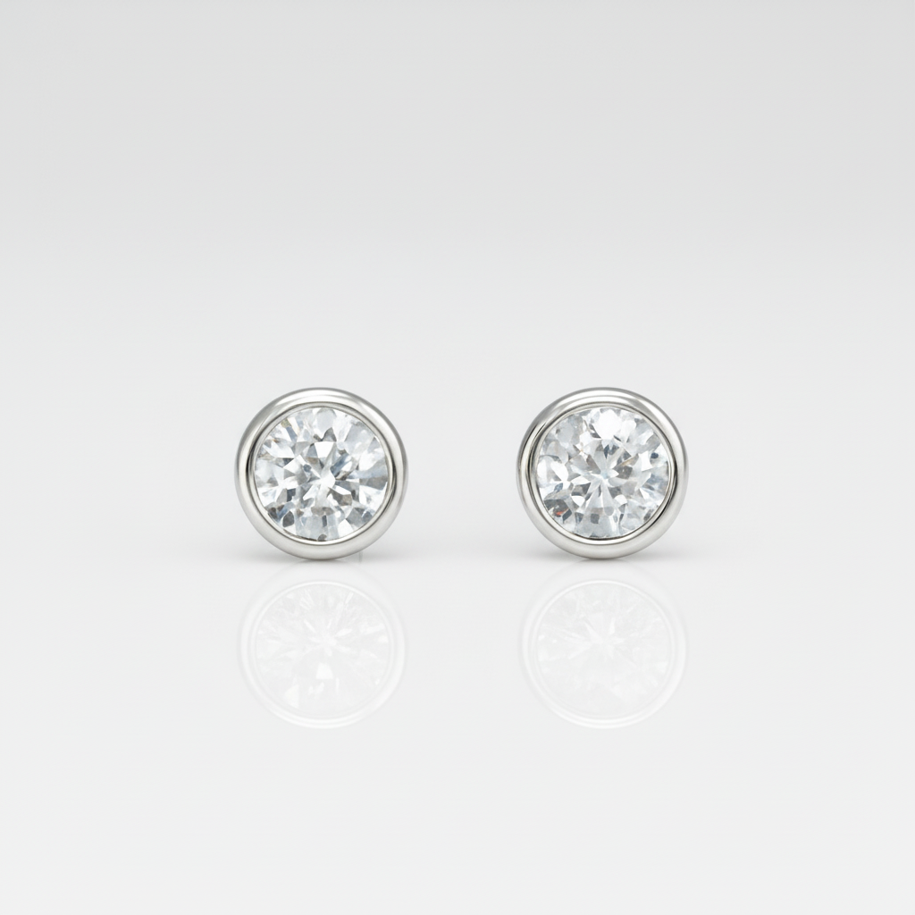 Обеци от бяло злато с диаманти в обков 0.12 карата