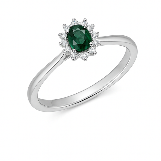 White gold ring with emerald and diamonds 0.32 carats
