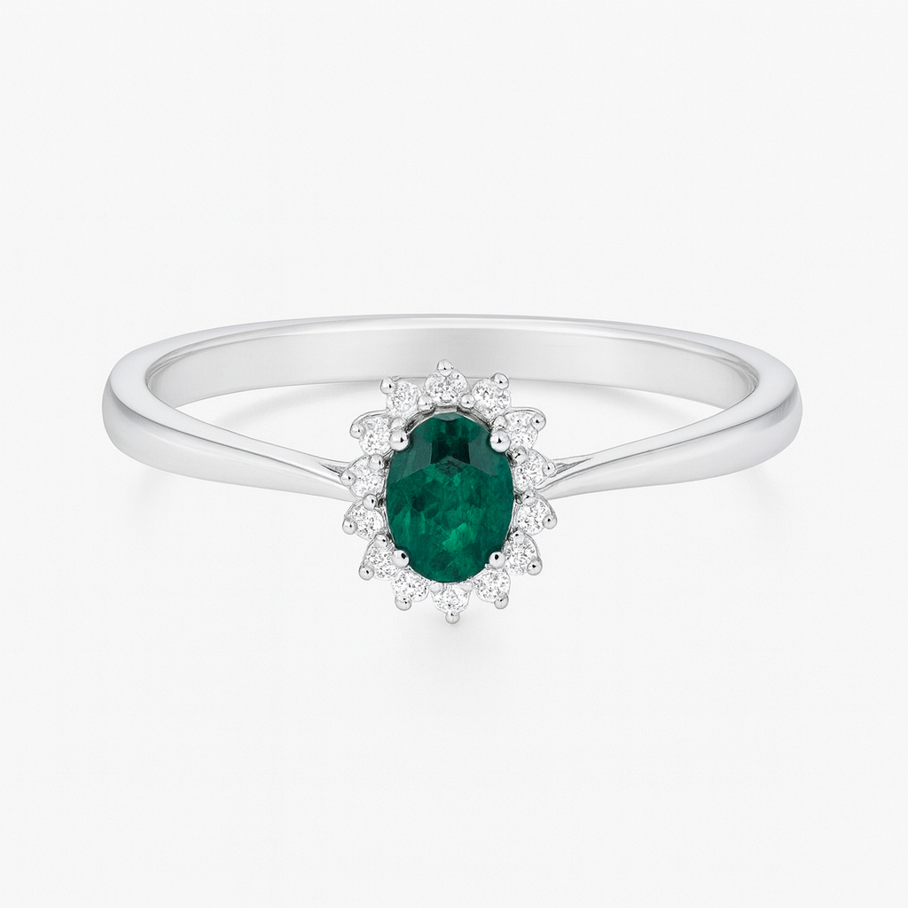 White gold ring with emerald and diamonds 0.32 carats