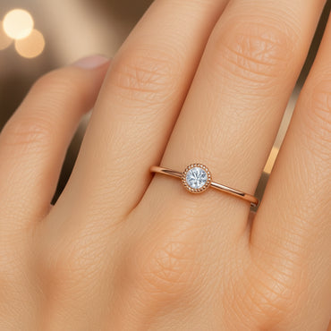 Дамски пръстен от розово злато с диамант в обков 0.13 карата
