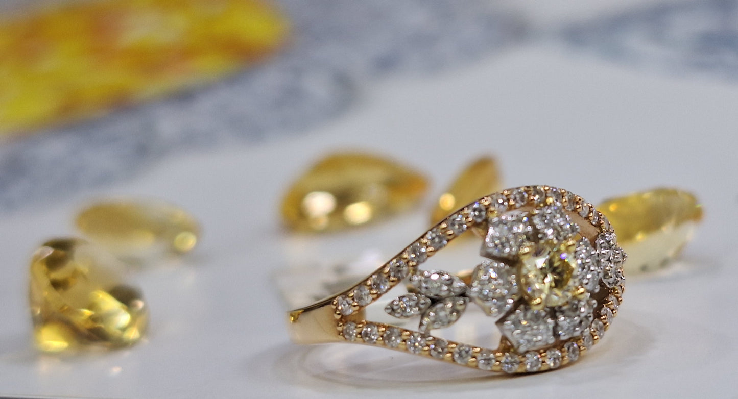 Дамски пръстен от розово злато с жълт диамант и бели диаманти 0.56 карата