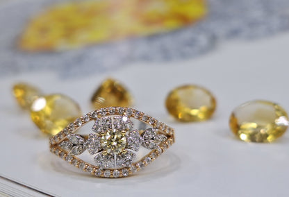 Дамски пръстен от розово злато с жълт диамант и бели диаманти 0.56 карата