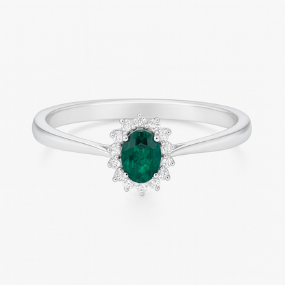 White gold ring with emerald and diamonds 0.32 carats